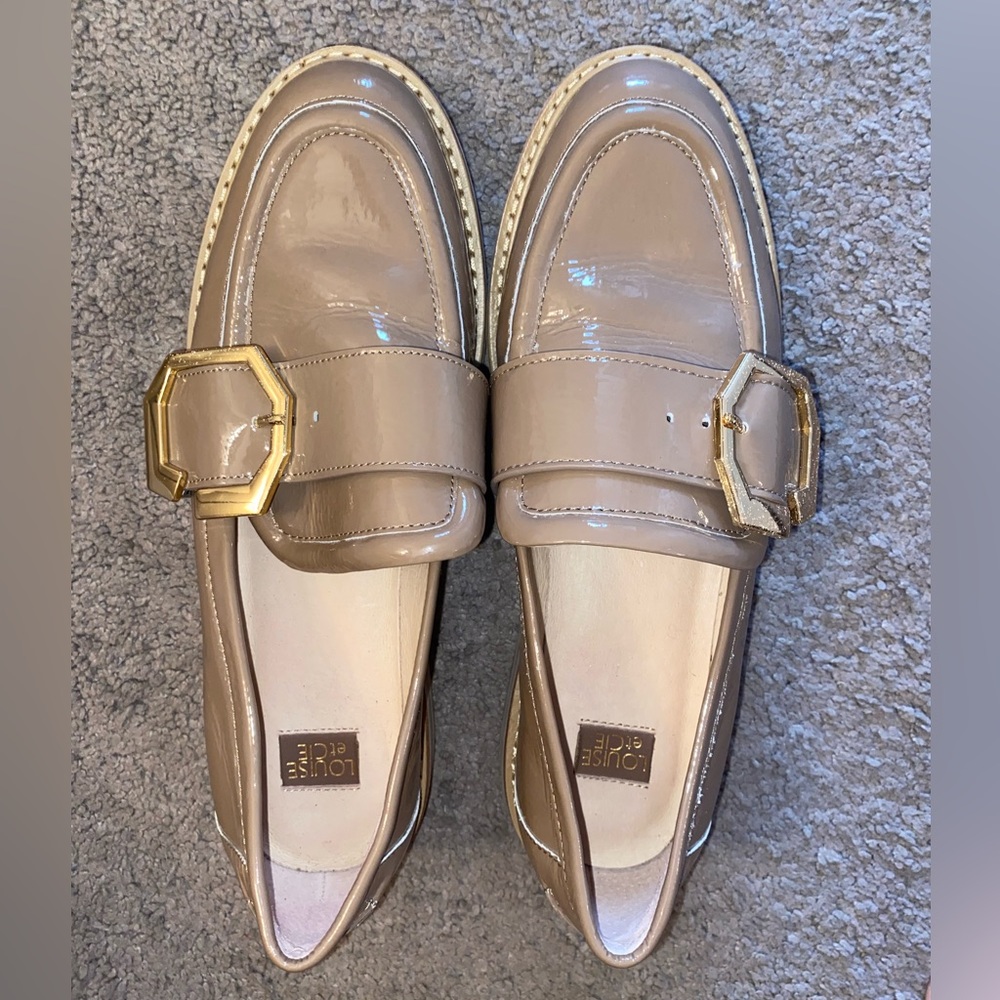 Tan faux leather work loafers.